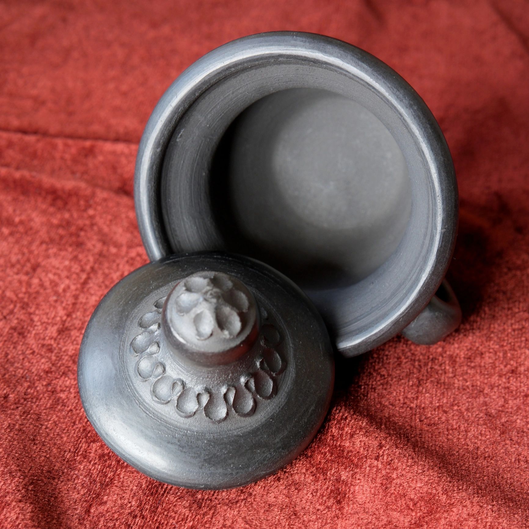 Handcrafted clay vessel in soft natural light