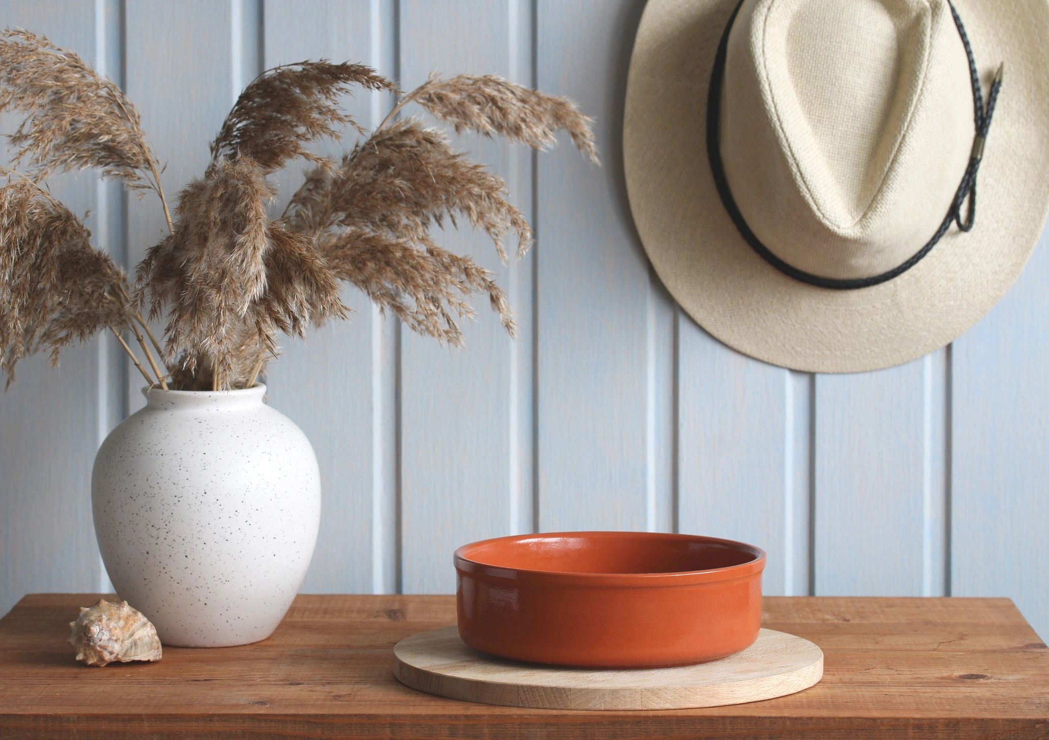 Terracotta bowl styled in a calm interior setting